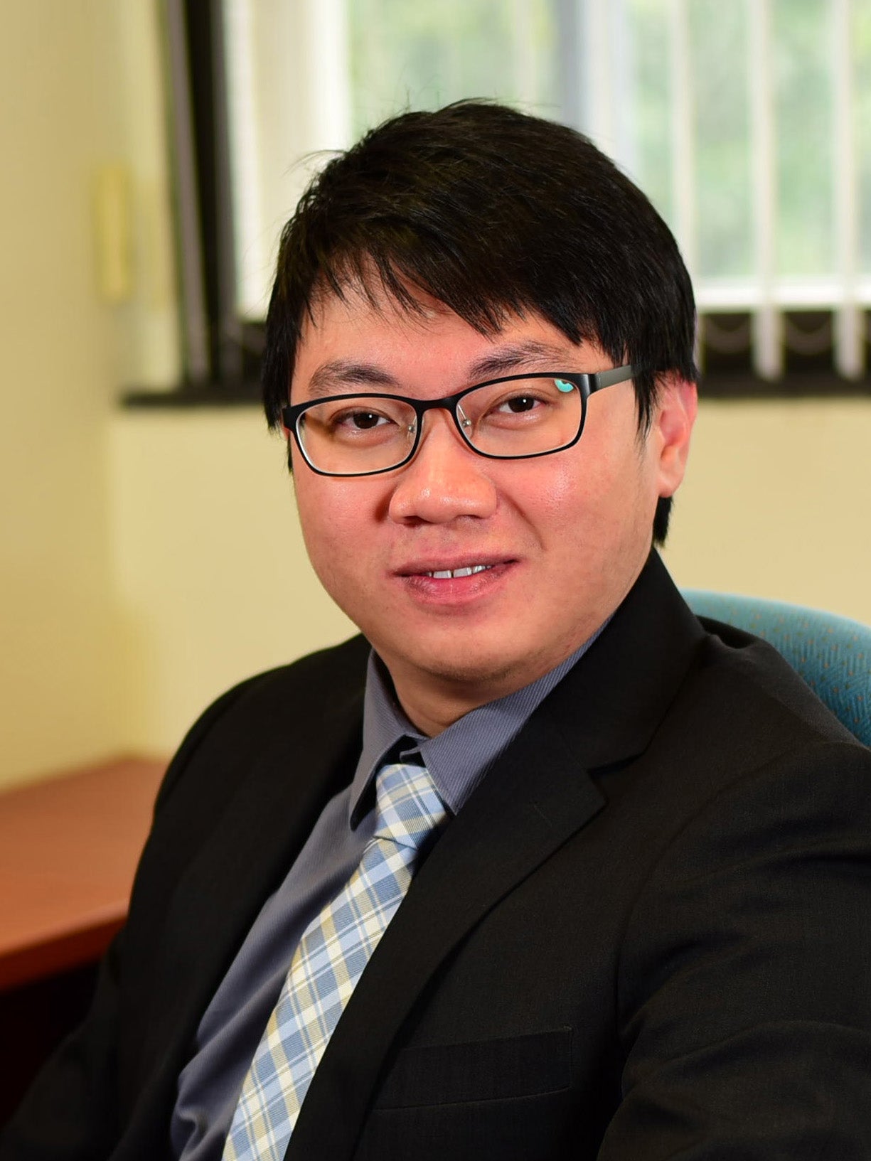Zhi Kuang Tan